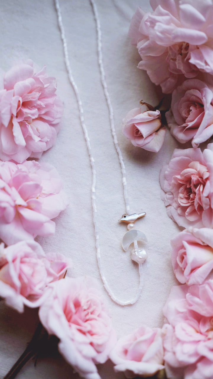 Gardenia Dove – White Beaded Pearl Necklace with Moon & Bird