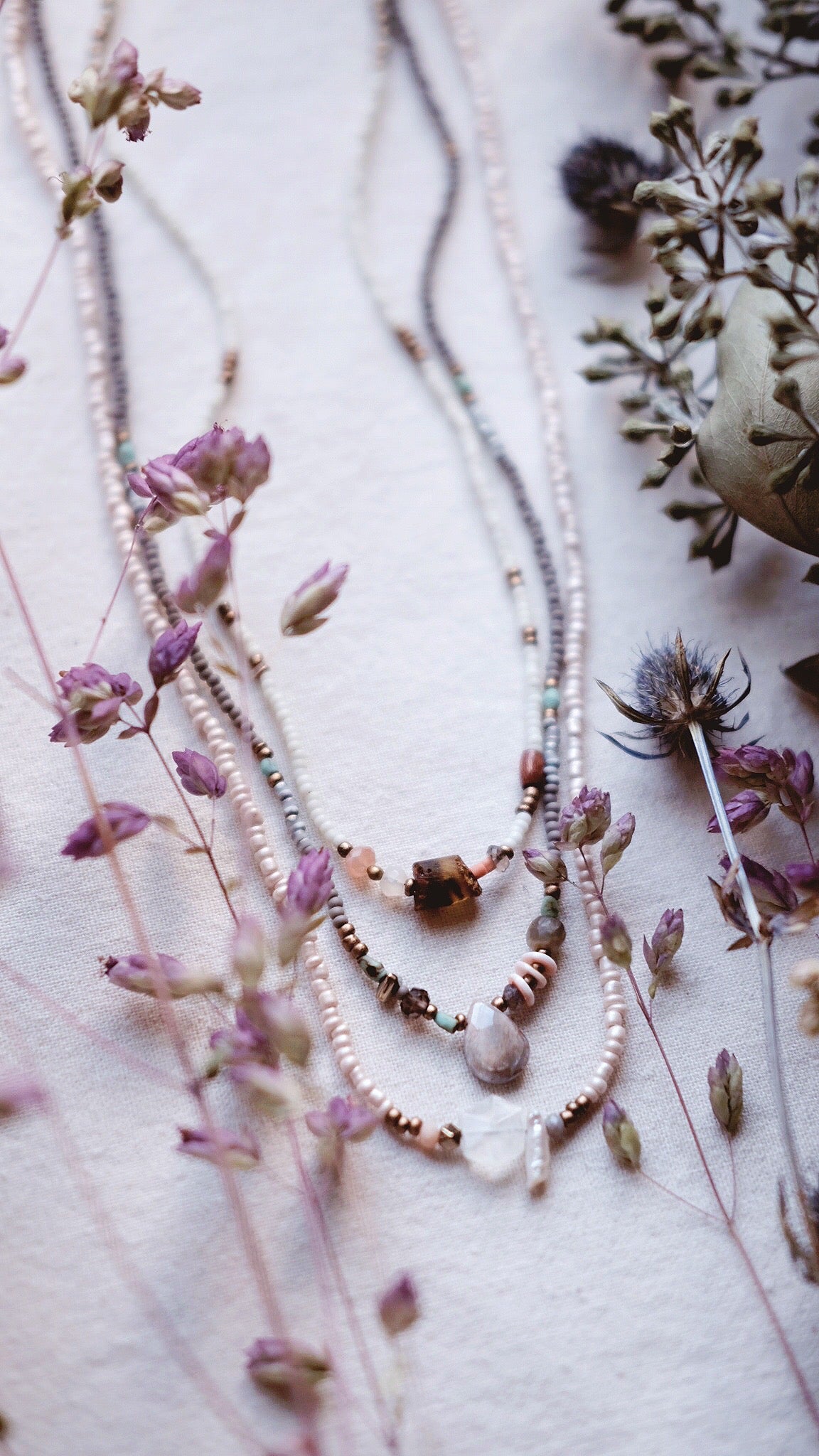 The Numinous + Baltic Amber + Moonstone + Fossilized Coral + Wood + Labradorite necklace