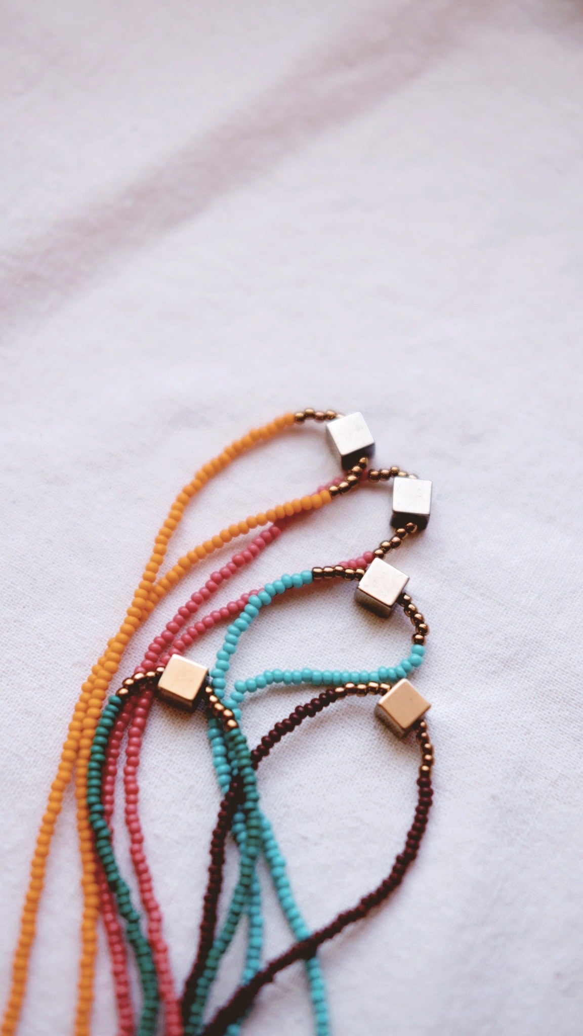 Festival Parade + Minimalist Pyrite and Vintage glass beaded necklaces