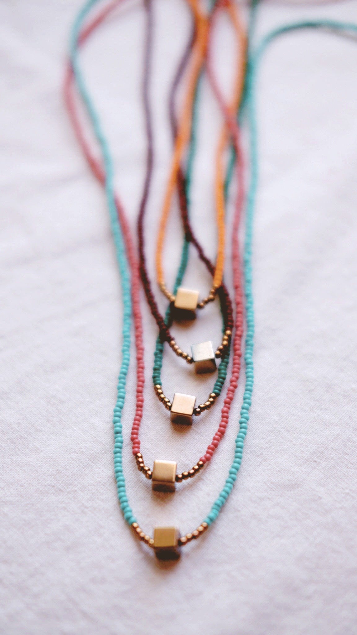 Festival Parade + Minimalist Pyrite and Vintage glass beaded necklaces