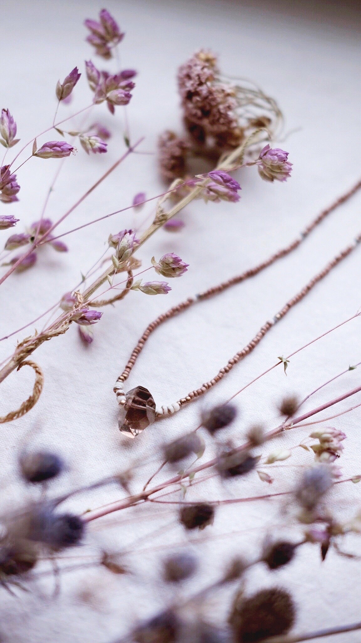 Luminescence + Smoky Quartz cream and bronze necklace