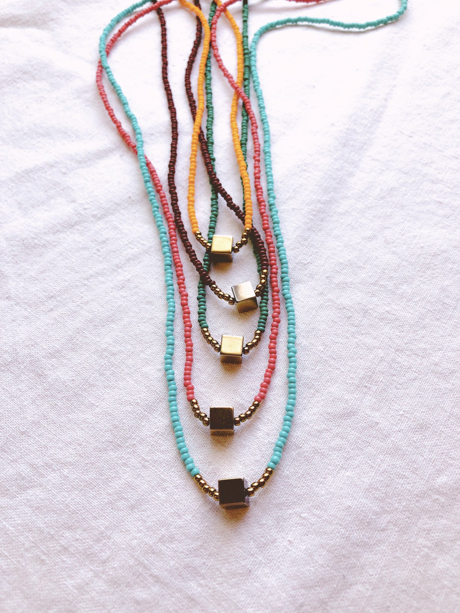 Festival Parade + Minimalist Pyrite and Vintage glass beaded necklaces
