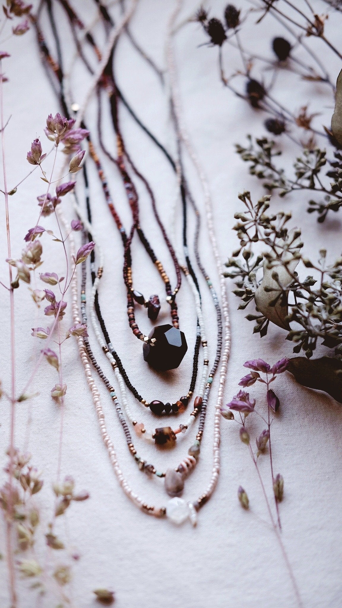 The Numinous + Baltic Amber + Moonstone + Fossilized Coral + Wood + Labradorite necklace