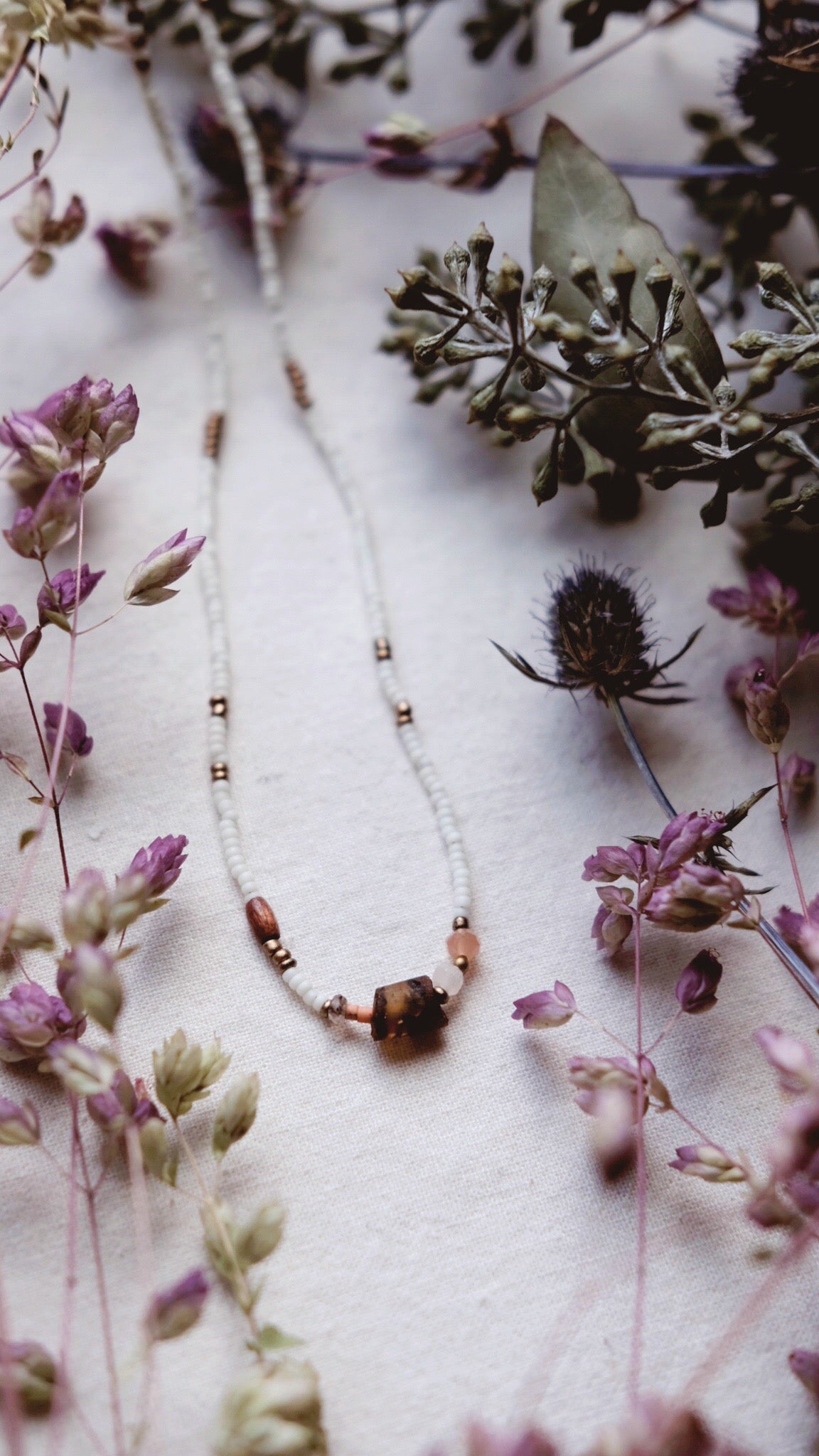 The Numinous + Baltic Amber + Moonstone + Fossilized Coral + Wood + Labradorite necklace